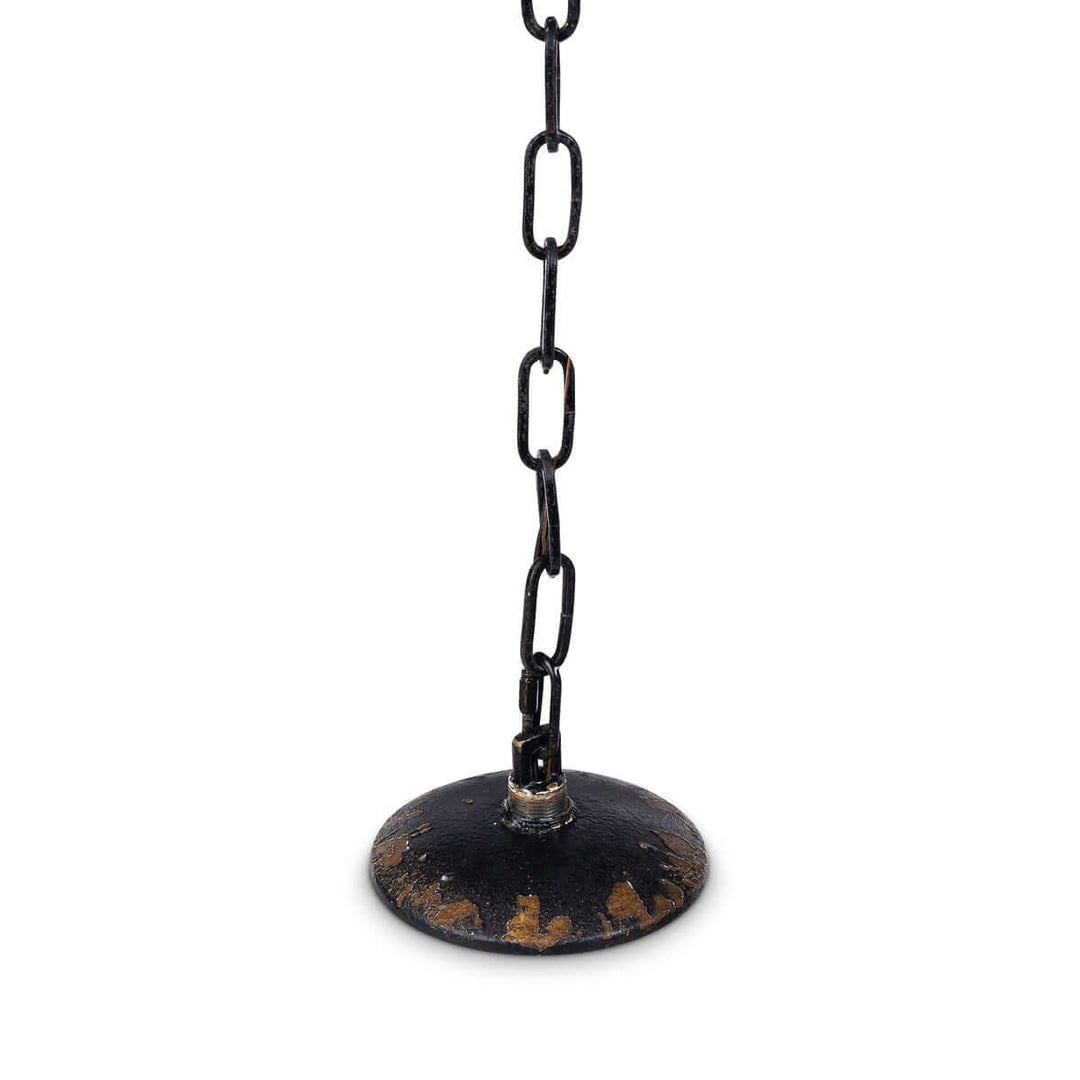 Close-up of distressed black iron chain and ceiling mount of a Rustic French Country Chandelier.
