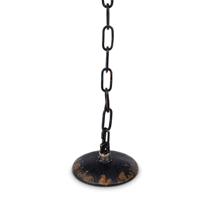 Close-up of distressed black iron chain and ceiling mount of a Rustic French Country Chandelier.
