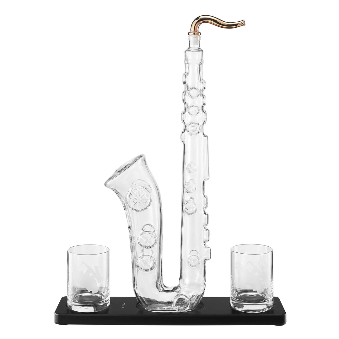 Saxophone Whiskey Decanter Set with Glasses featuring a saxophone-shaped decanter and two glasses on a sleek black tray.