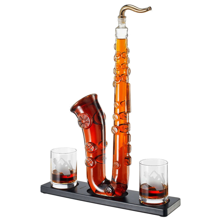 Saxophone Whiskey Decanter Set with Glasses on display with two glasses and a saxophone-shaped decanter.