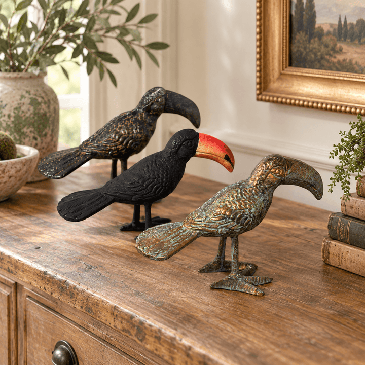 Sculpted Iron Toucan Figurine trio viewed from the side