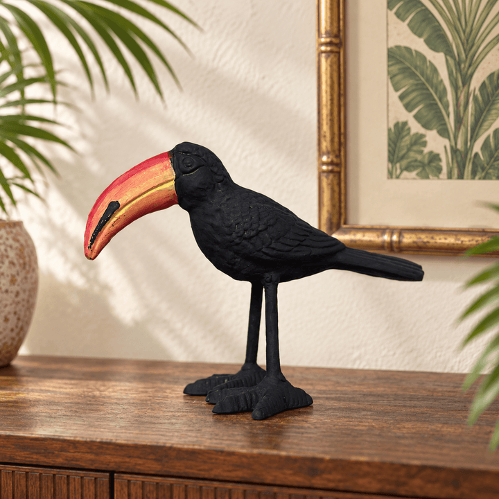 Black Sculpted Iron Toucan Figurine with a red and gold beak