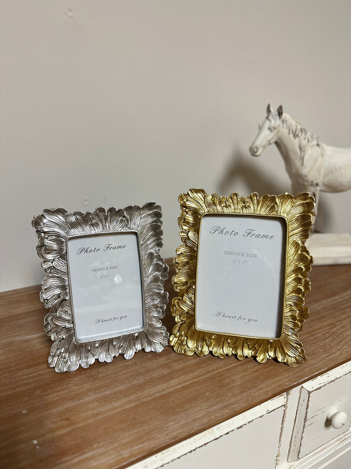 Sculpted Leaf Photo Frame in Gold or Silver shown in both finishes and sizes