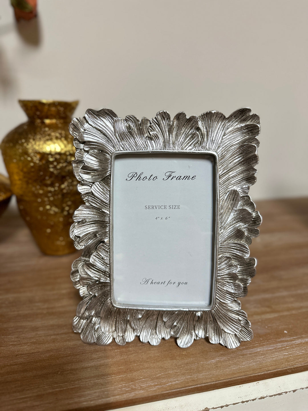 Silver Sculpted Leaf Photo Frame for a 4 by 6 photograph