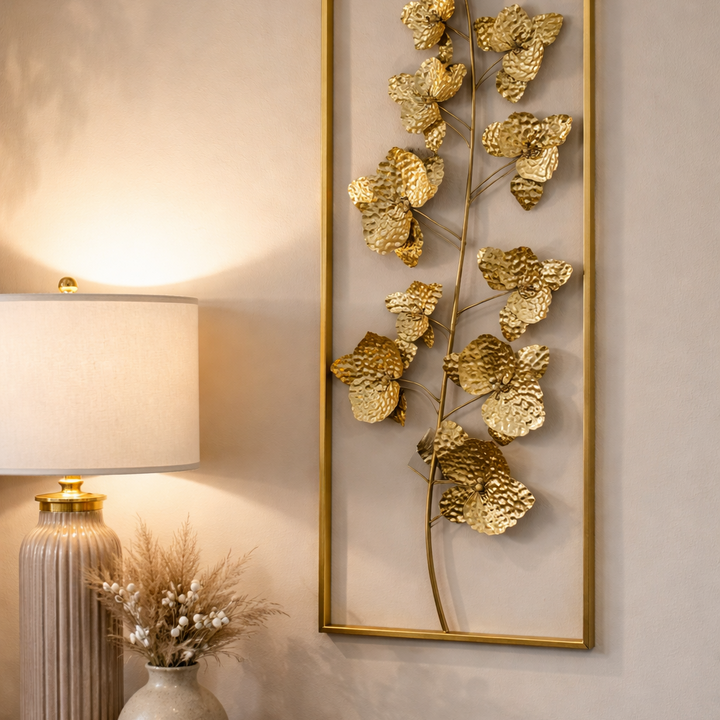 Gold sculpted metal flower wall panel shown full length