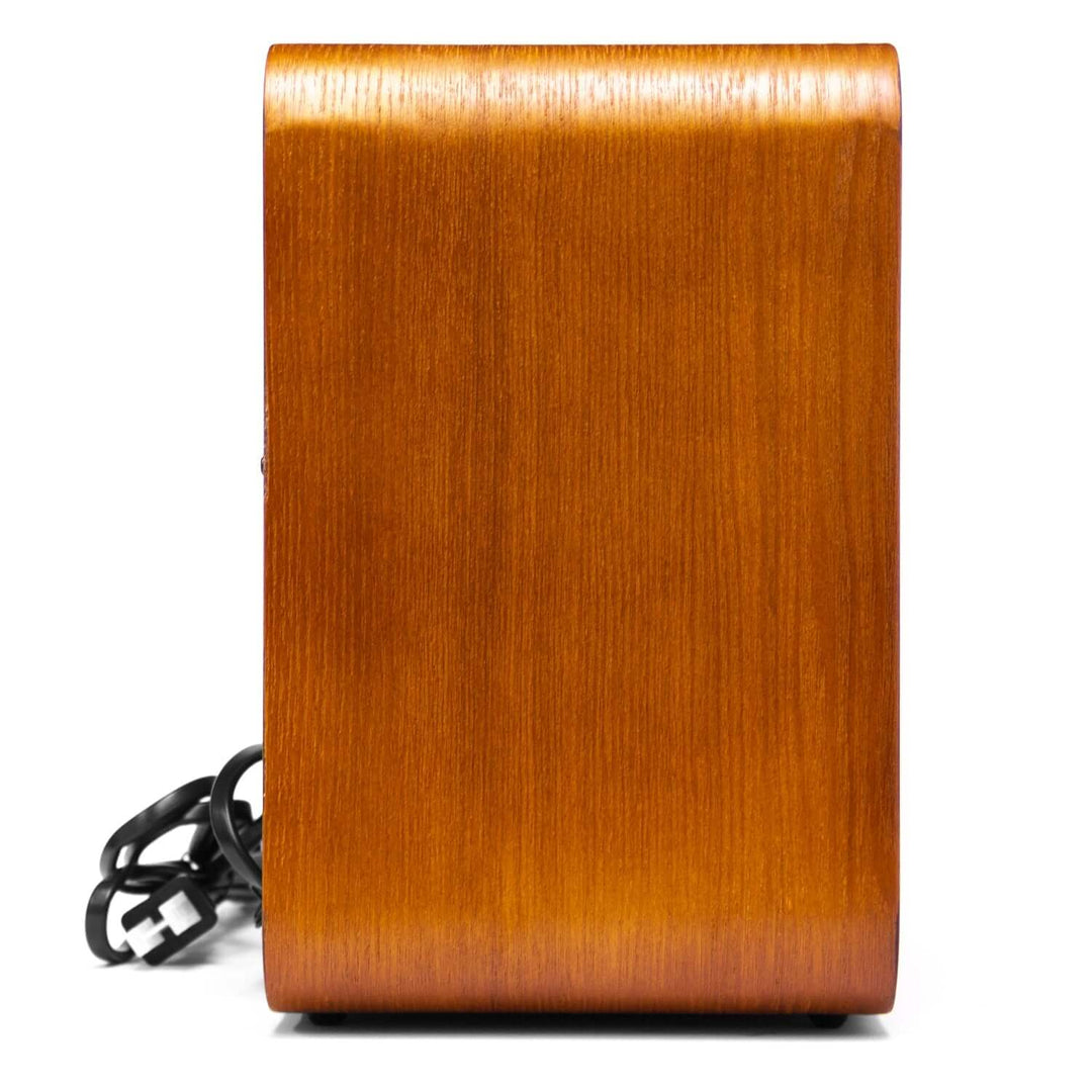 Wooden electronic device with a power cord on a white background