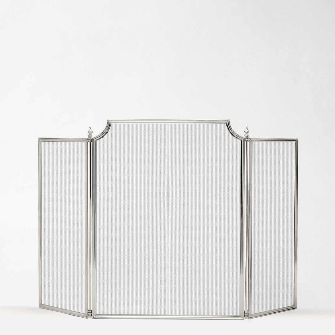 Metallic fireplace screen on a white background