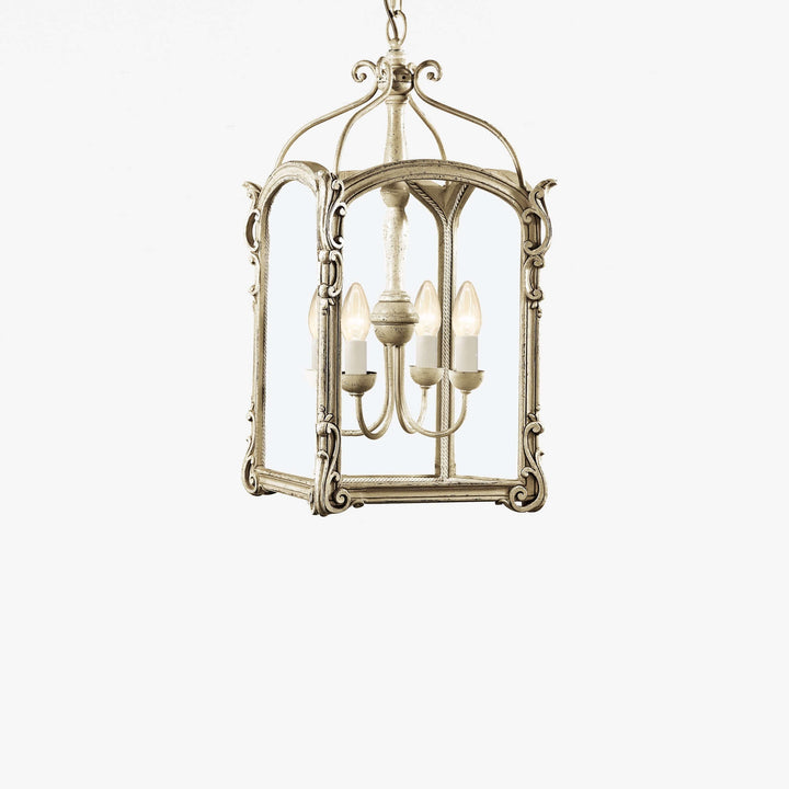 Decorative pendant light with ornate design on a white background