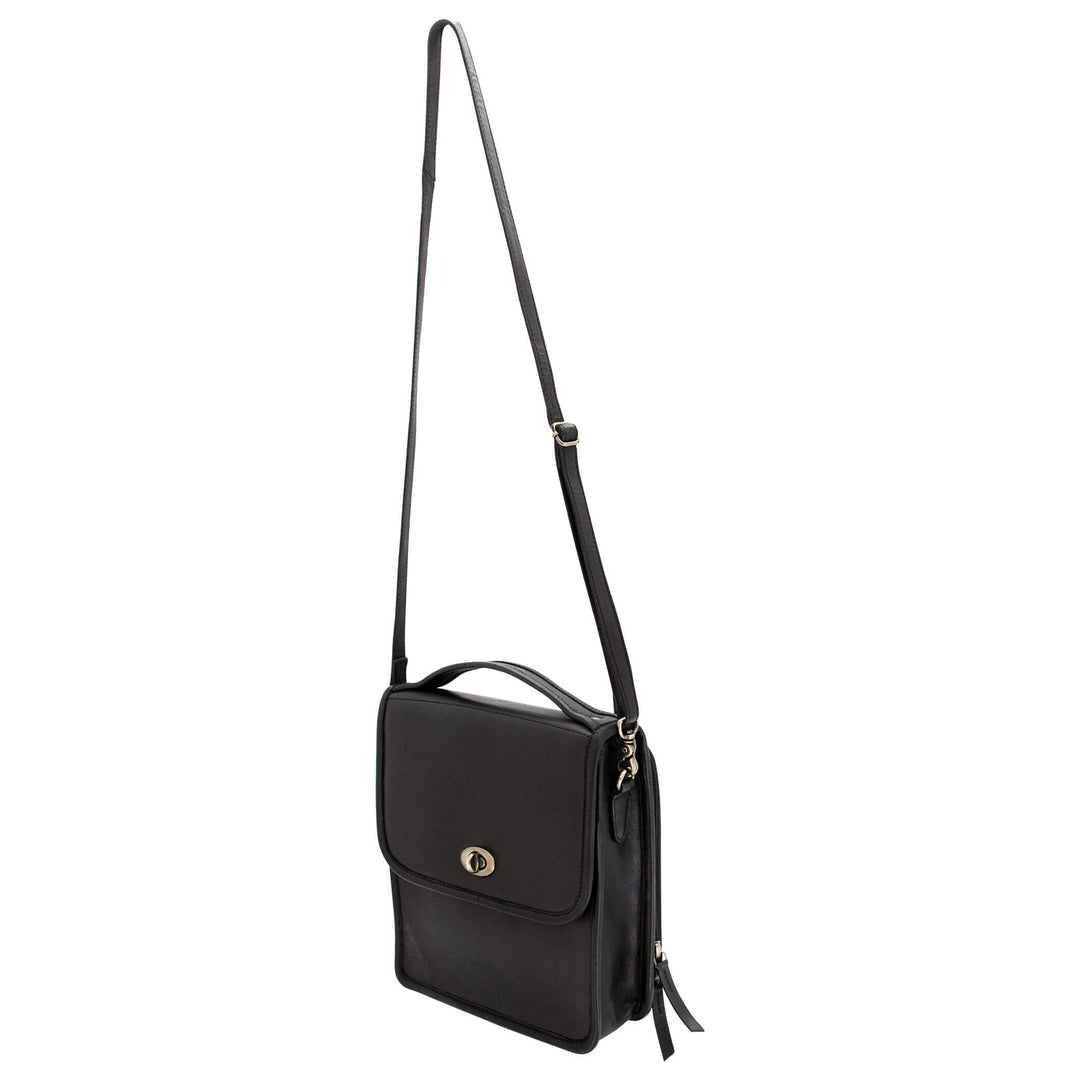 Smith & Wesson Vintage Crossbody Concealed Carry Purse in black leather with adjustable strap and clasp closure.