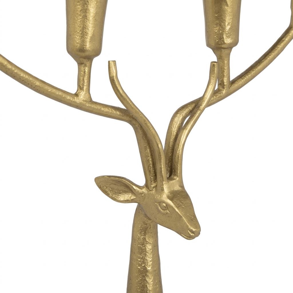 Close-up of the stag's head and branching antler arms on the Stag Antler Candelabra in Antiqued Gold Iron