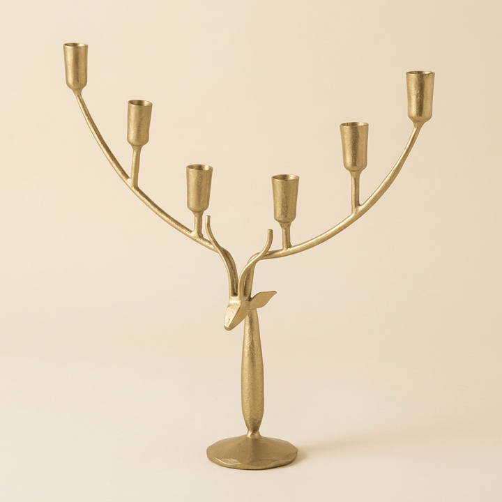 Stag Antler Candelabra in Antiqued Gold Iron, large size on a warm cream studio background