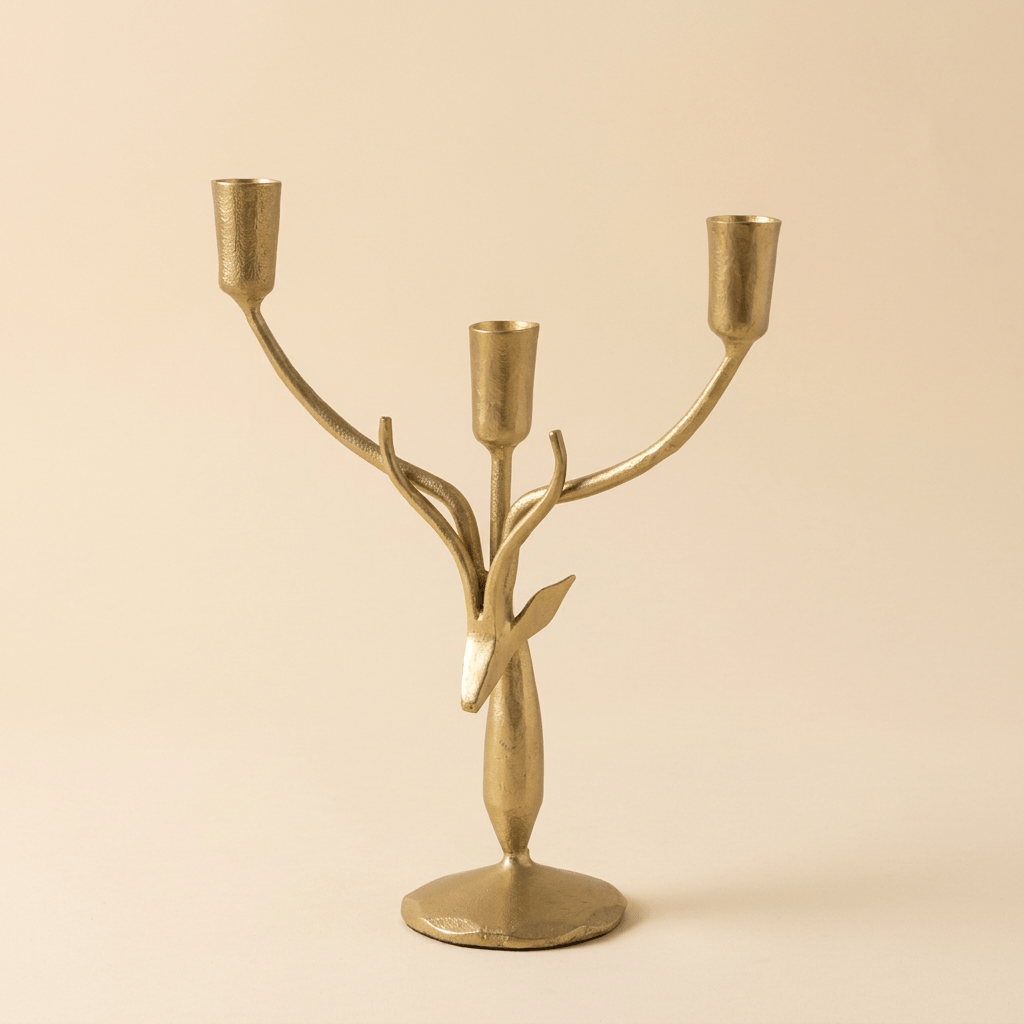 Stag Antler Candelabra in Antiqued Gold Iron, small size on a warm cream studio background
