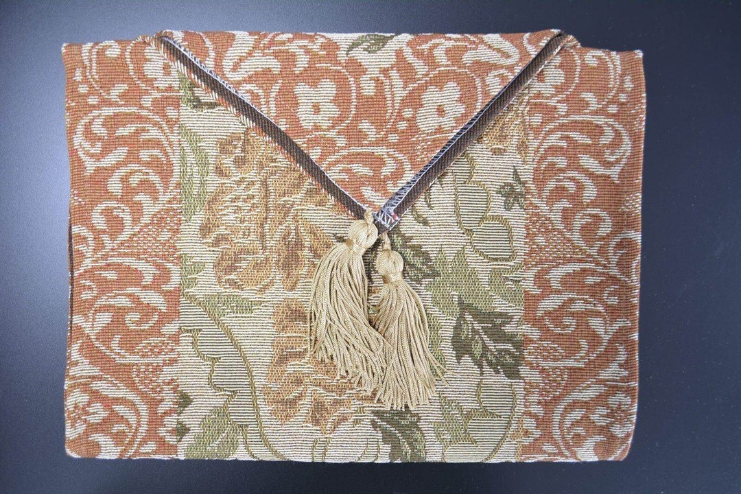 DaDa Bedding Floral Nature Garden Beige Orange Spices Tapestry Table Runner (10072) with golden tassels on dark background