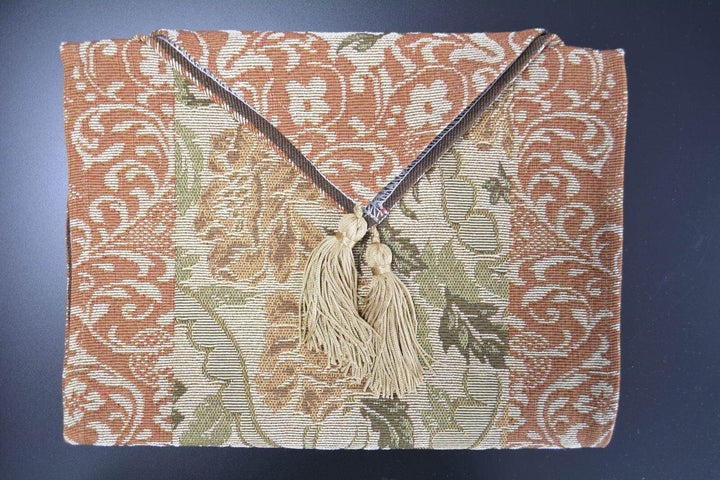 DaDa Bedding Floral Nature Garden Beige Orange Spices Tapestry Table Runner (10072) with golden tassels on dark background