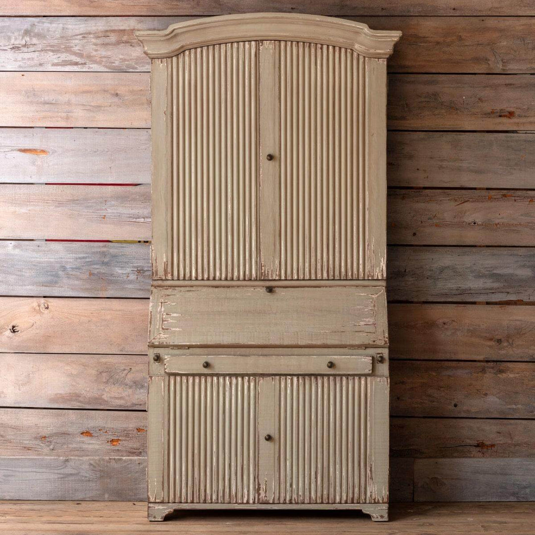 Tall Reclaimed Wood Secretary Cabinet showcasing rustic European elegance with an elongated silhouette and architectural design.