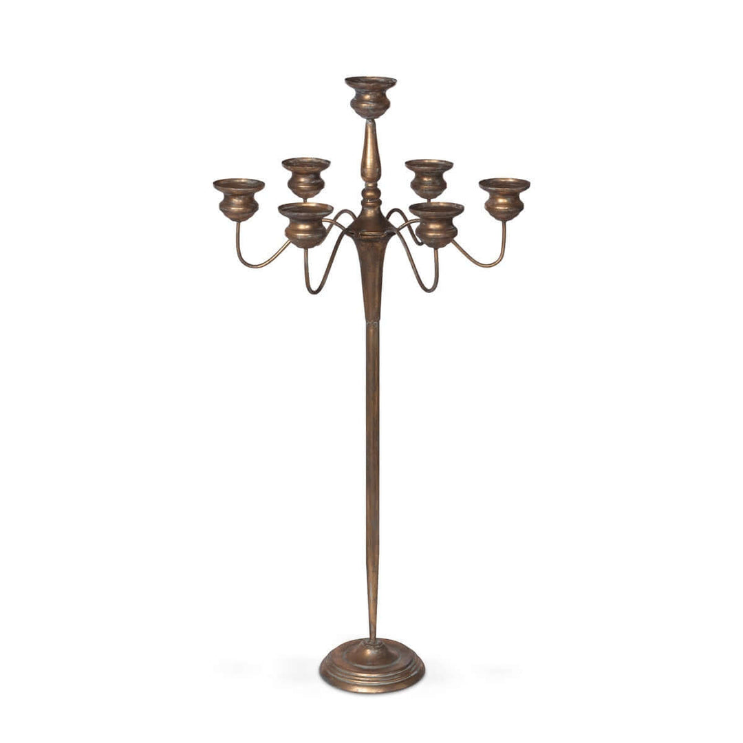 Tall vintage iron candelabra centerpiece with bronze finish for elegant events, perfect for adding timeless romance to gatherings.