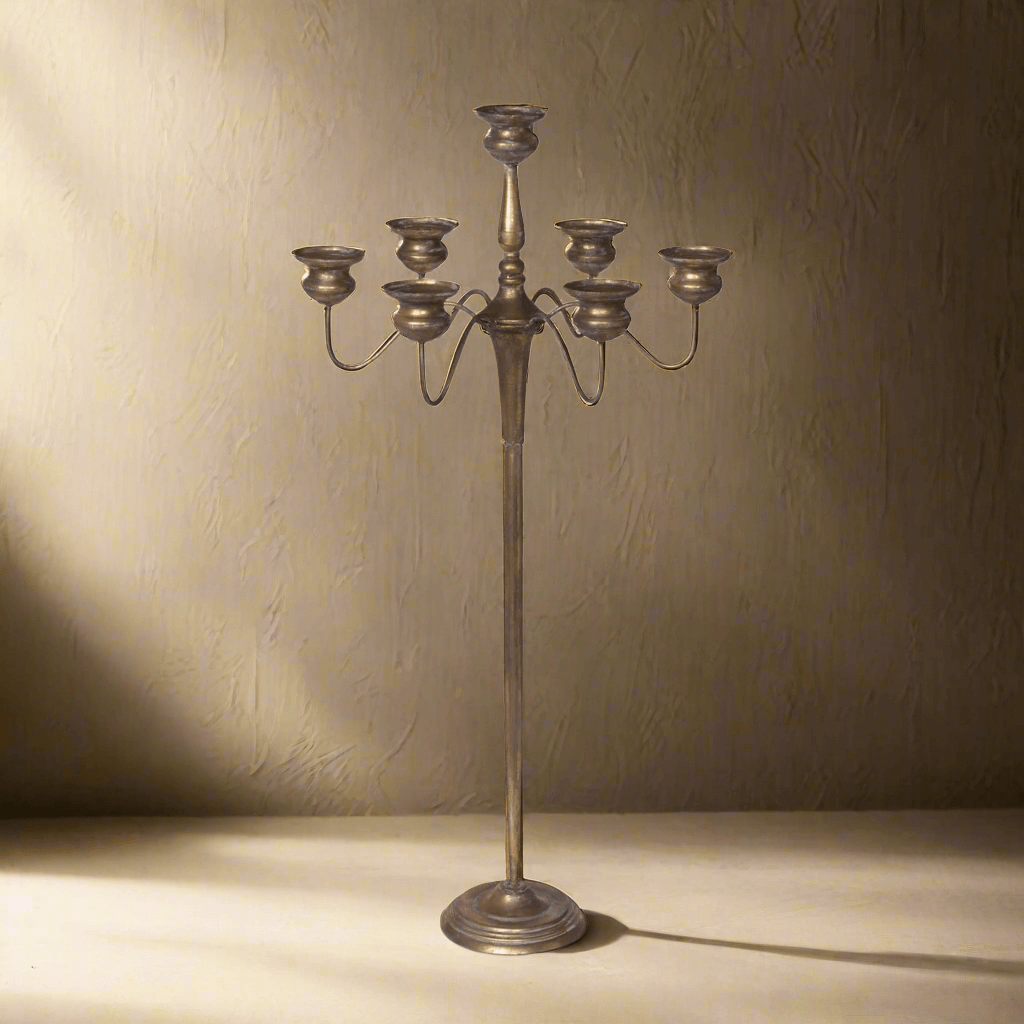 Tall vintage iron candelabra centerpiece for elegant events, 40 inches high, with deep bronzed iron finish, perfect for gatherings.