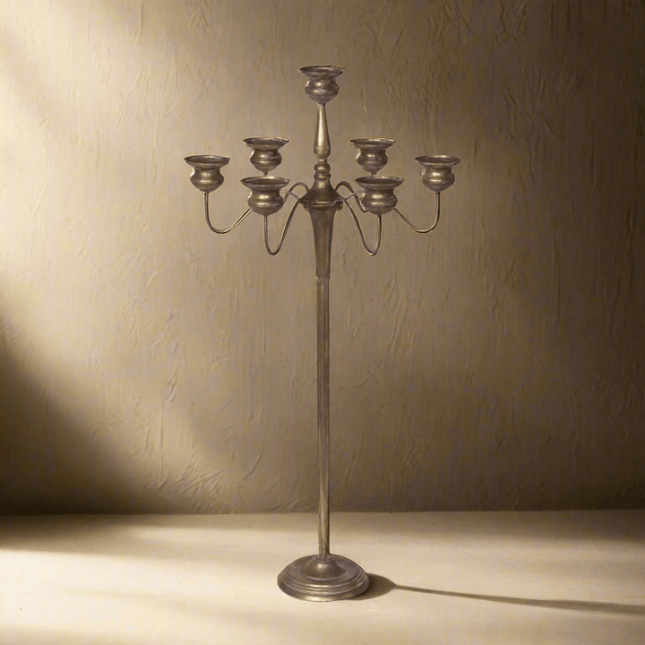 Tall vintage iron candelabra centerpiece for elegant events, 40 inches high, with deep bronzed iron finish, perfect for gatherings.