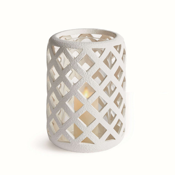 Terracotta hurricane candle holder with glass insert, featuring an airy lattice design, ideal for tea lights.