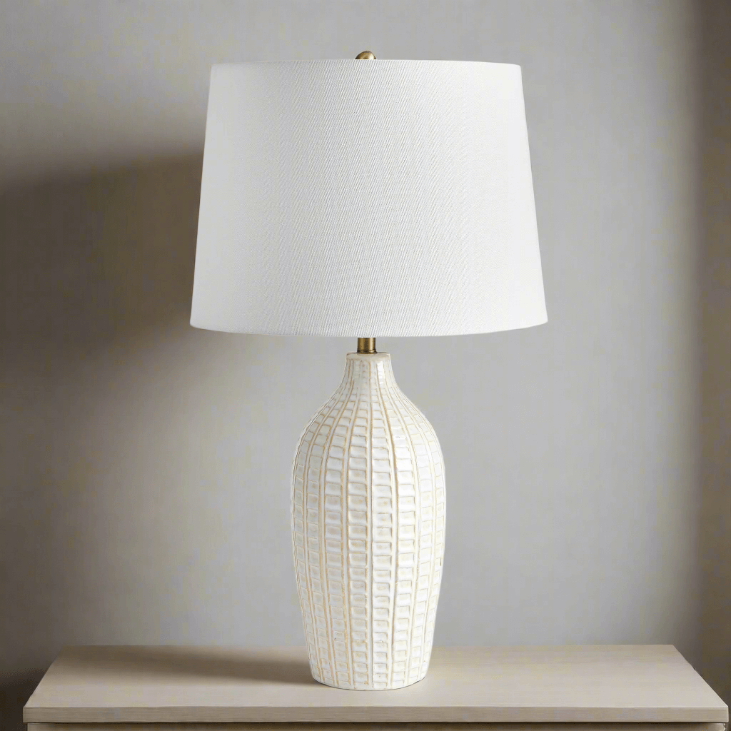 Textured vintage ceramic table lamp with white glaze, showcasing a grid pattern and elegant design.