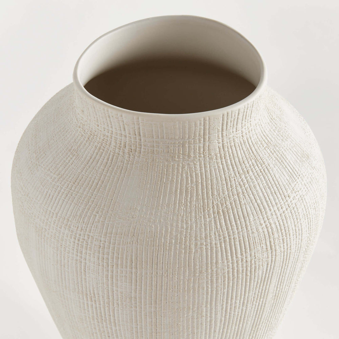 Textured white ceramic vase by Barclay Butera with cross-hatched detail and matte finish, showcasing modern minimalism and timeless design.