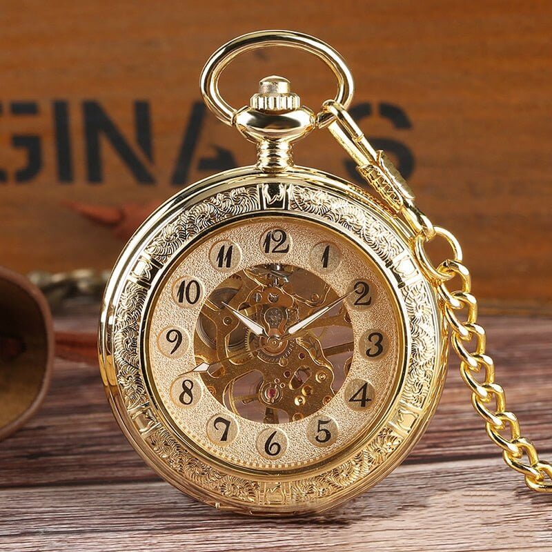 Vintage Silver and Gold Mechanical Pocket Watches with skeleton dial and intricate gold detailing, showcasing classic elegance and mechanics.