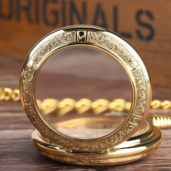 Vintage Silver and Gold Mechanical Pocket Watches with skeleton dial and intricate gold design on wooden background.