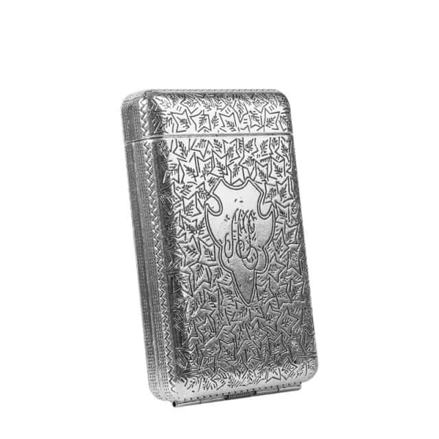 Vintage 1920s Cigarette Case with etched metal design and spring-loaded hinge, embodying the elegance and craftsmanship of the Roaring Twenties.