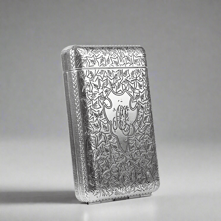 Vintage 1920s Cigarette Case with etched metal design showcasing Roaring Twenties elegance, featuring a spring-loaded hinge.