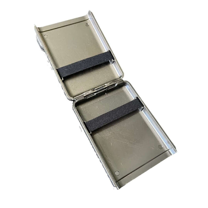 Open Vintage 1920s Cigarette Case showcasing etched metal design and classic spring-loaded hinge from the Roaring Twenties.