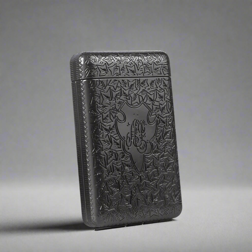 Vintage 1920s Cigarette Case with etched metal design and elegant craftsmanship.