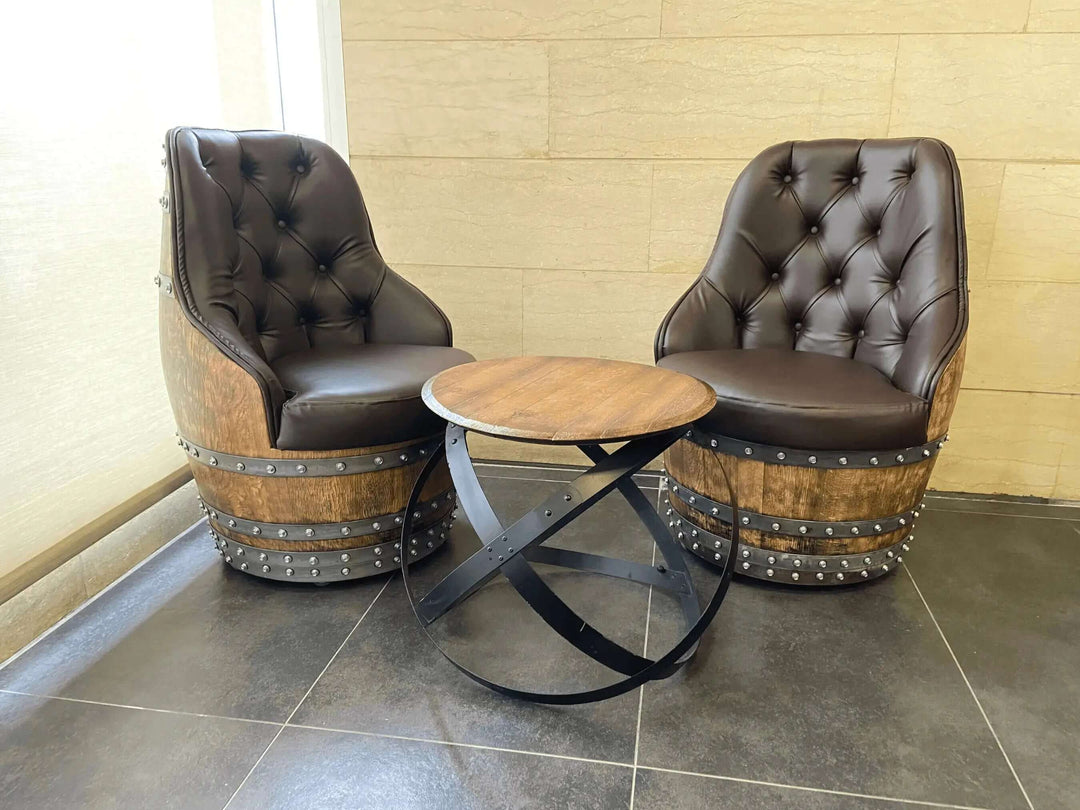 Pair of Tufted Vintage Barrel Chairs with round side table, showcasing farmhouse elegance and handcrafted design with rich upholstery.