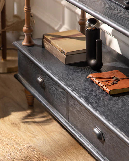 Close view of the two-drawer base with dark cup pulls