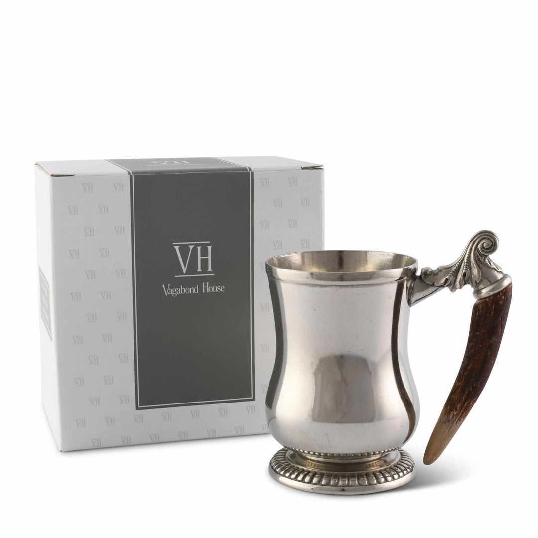 Silver tankard with wooden handle and Vagabond House branded box on a white background