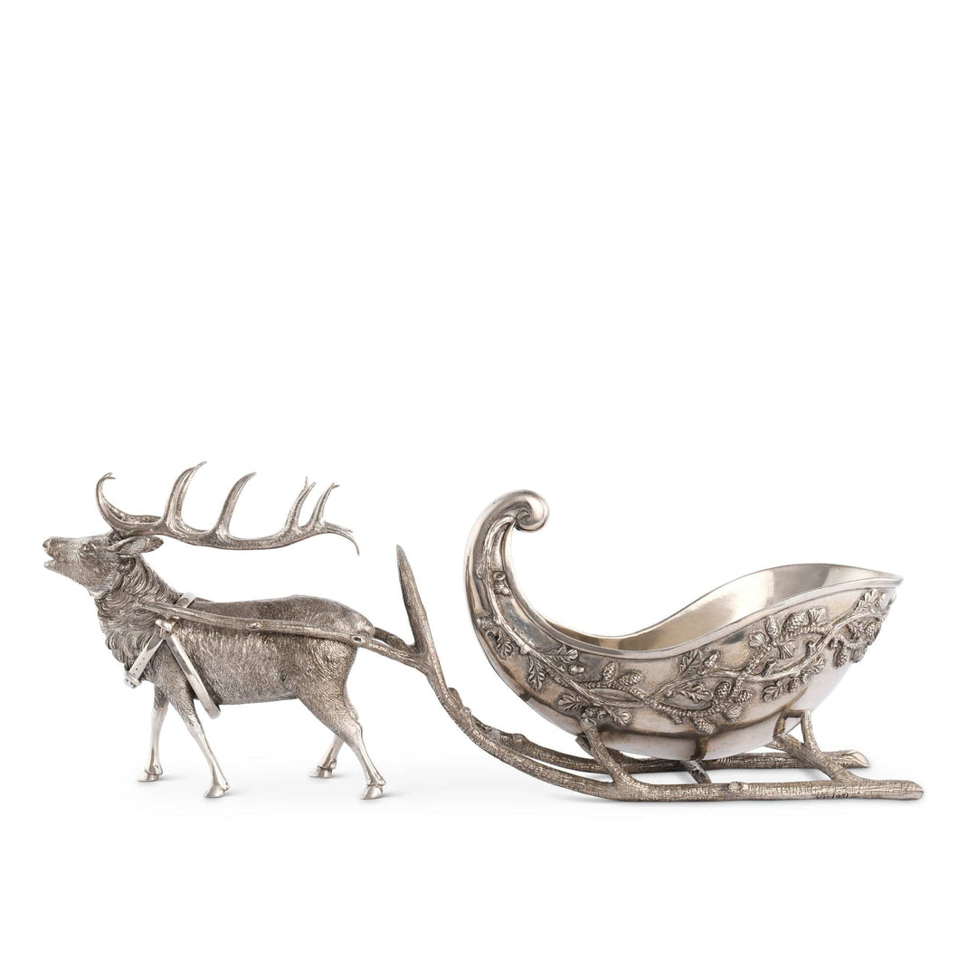 Silver reindeer and sleigh on a white background