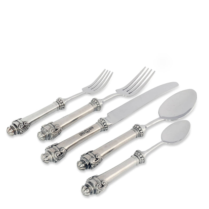 Set of silver flatware including forks, knives, and spoons on a white background