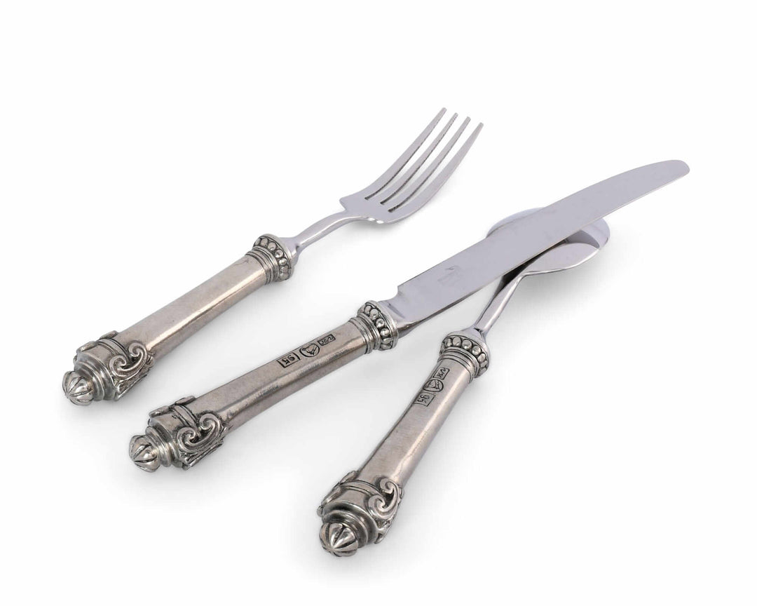 Silver fork and knife set on a white background