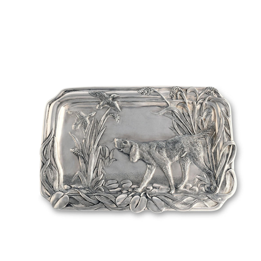 Silver tray with a dog design on a white background