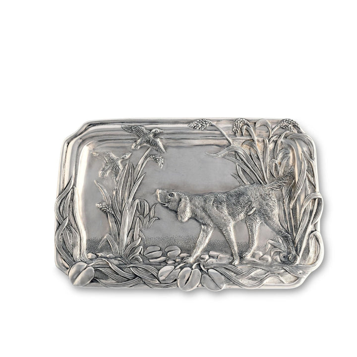 Silver tray with a dog design on a white background