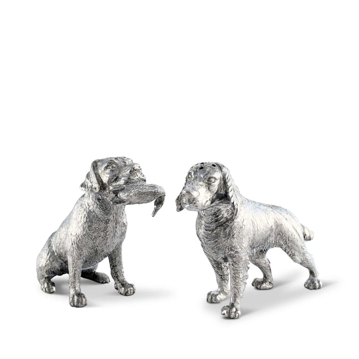 Two silver dog salt and pepper shaker figurines on a white background