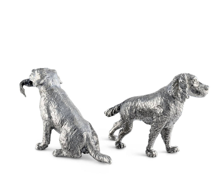 Two silver dog salt and pepper shaker figurines on a white background