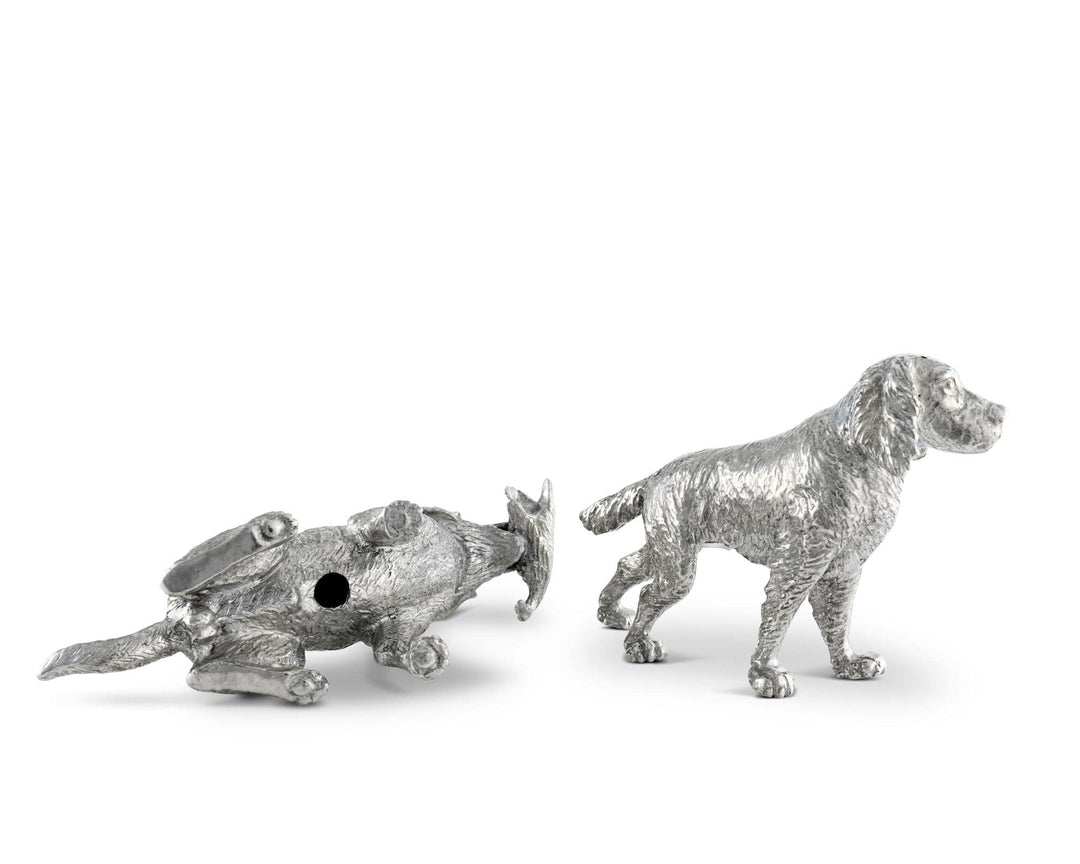 Two silver dog salt and pepper shaker figurines on a white background