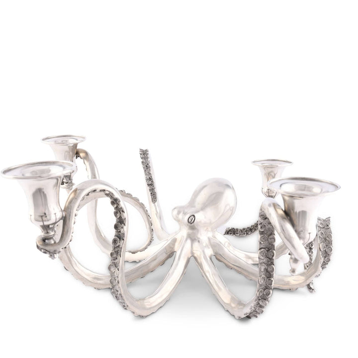 Silver octopus-shaped candle holder on a white background