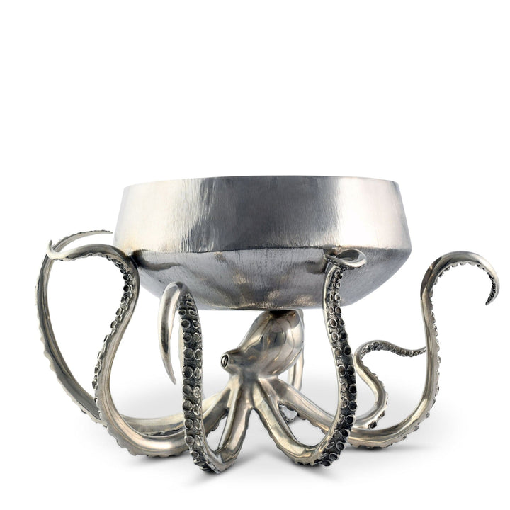 Metallic octopus-shaped wine chiller on a white background
