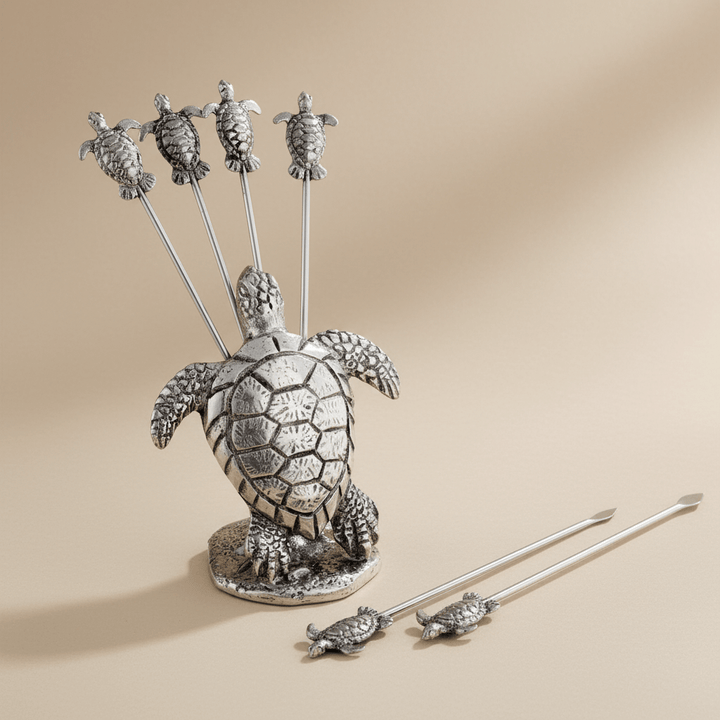 Decorative turtle stand with multiple skewers on a white background
