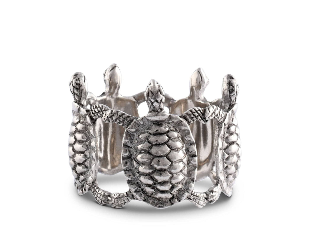 Silver turtle-shaped napkin ring on a white background