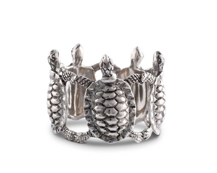 Silver turtle-shaped napkin ring on a white background