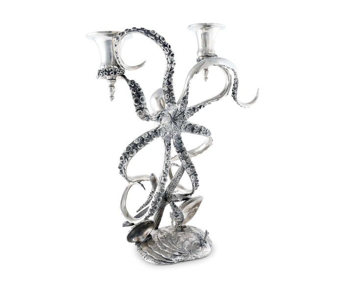 Silver octopus-shaped candle holder on a white background