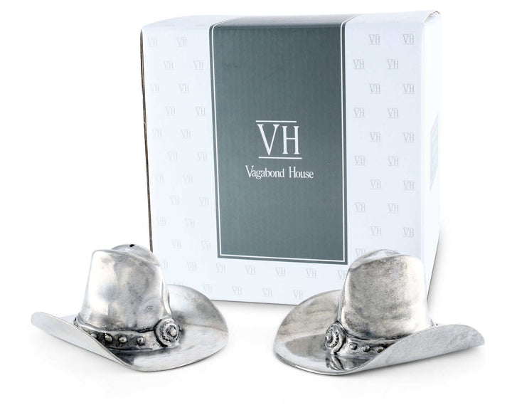 Silver cowboy hat shakers with Vagabond House packaging on a white background