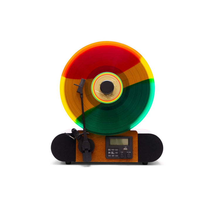 Colorful vinyl record on a turntable with a white background
